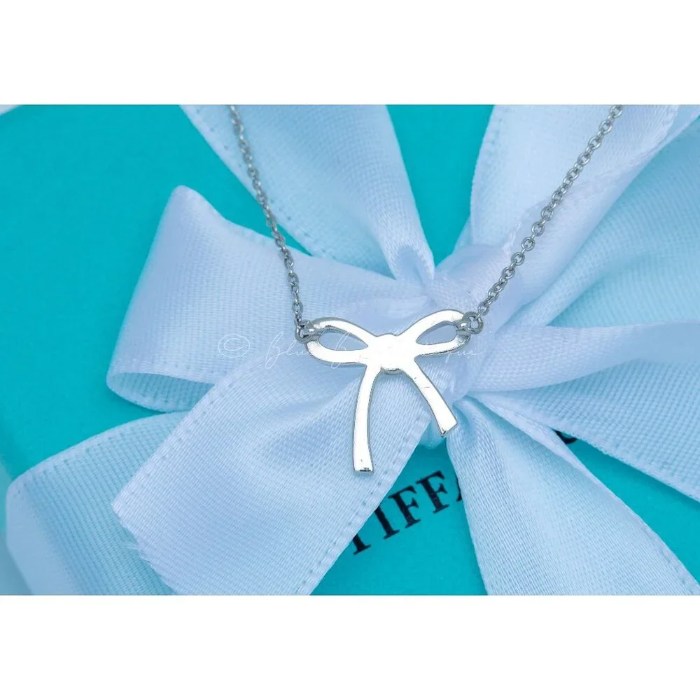 Tiffany & Co. Vintage Bow Necklace Ribbon Knot Pendant in Silver on a 16" Chain - Picture 6 of 9